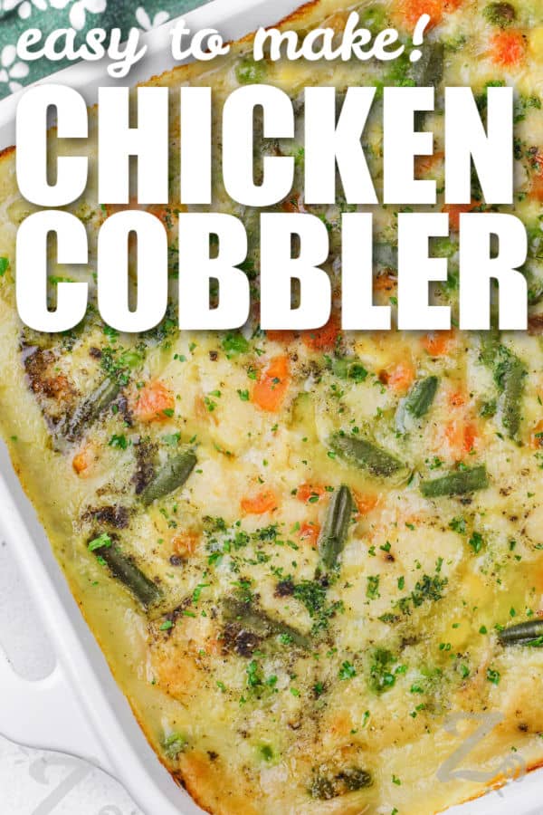 a casserole dish of chicken cobbler with text