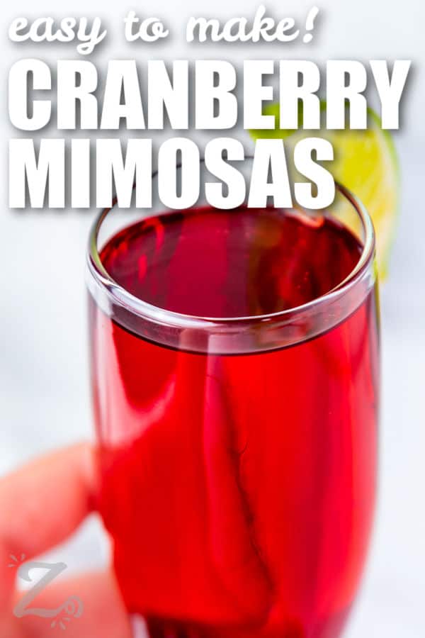 close up of Cranberry Mimosa with writing