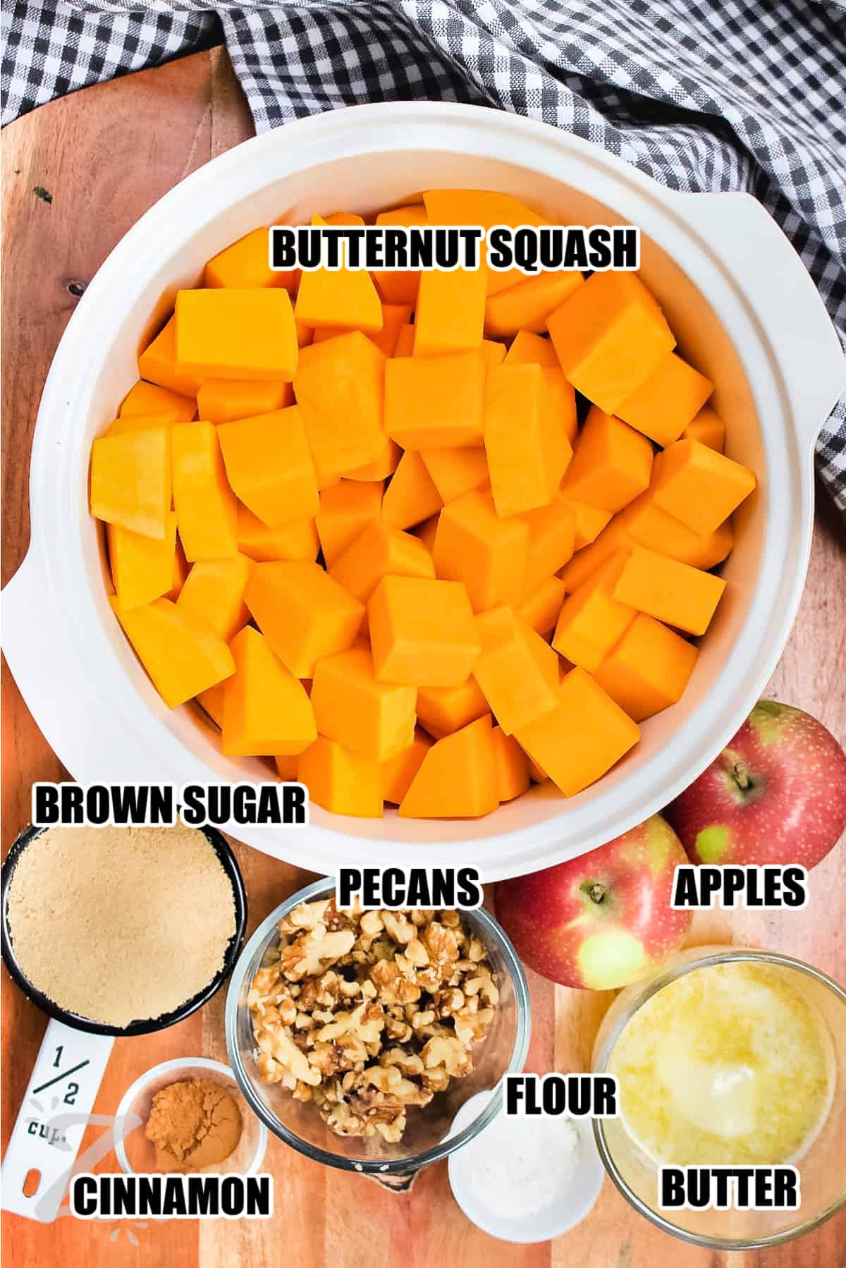 butternut squash casserole ingredients including butternut squash, apples, brown sugar, pecans, butter, flour, and cinnamon
