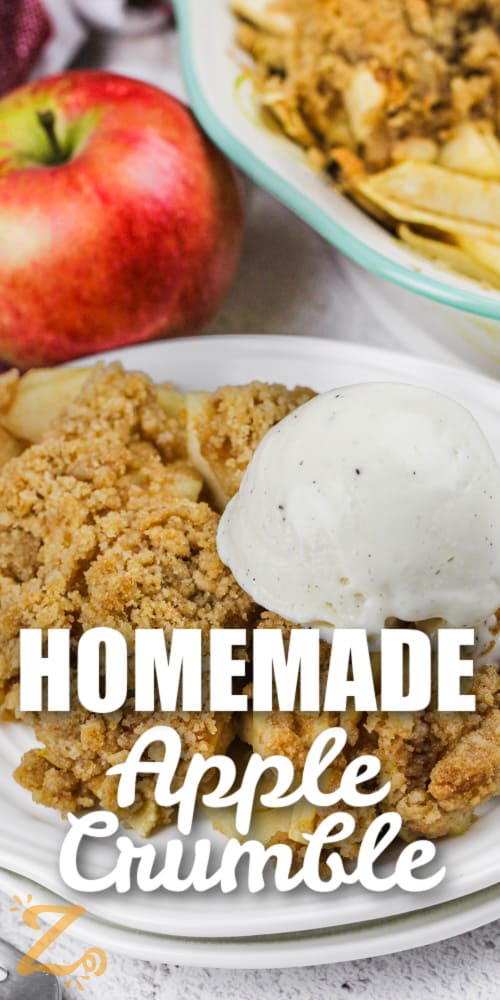 Apple Crumble on a plate with a scoop of ice cream and writing