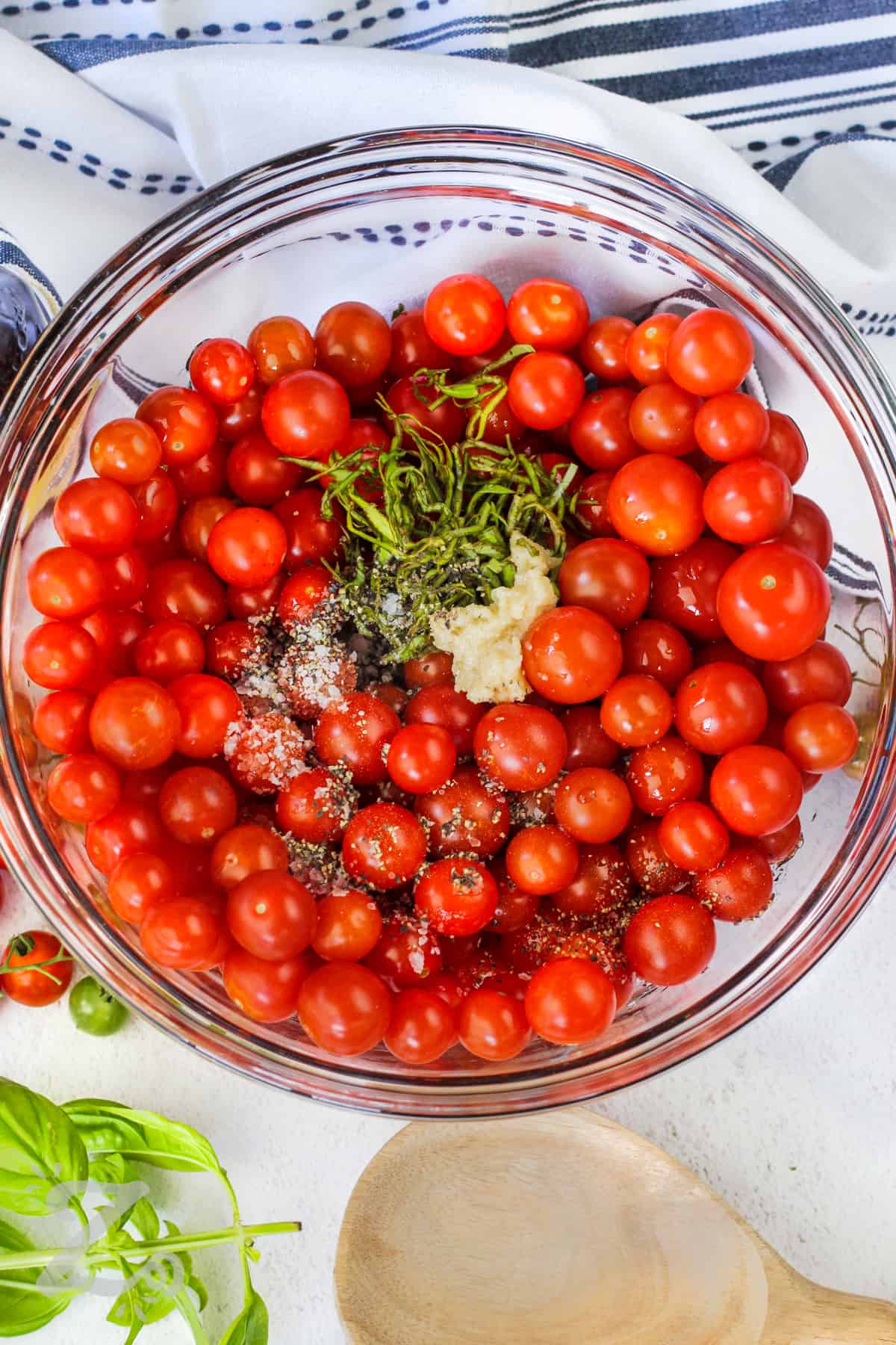 Roasted Cherry Tomatoes ingredients in a bowl before being mixed
