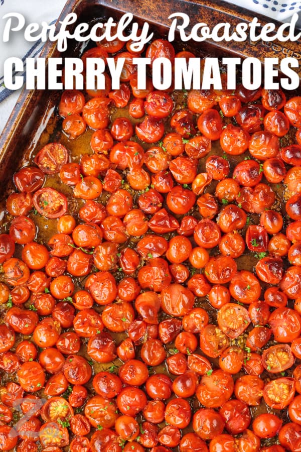 Roasted Cherry Tomatoes on a baking sheet with writing