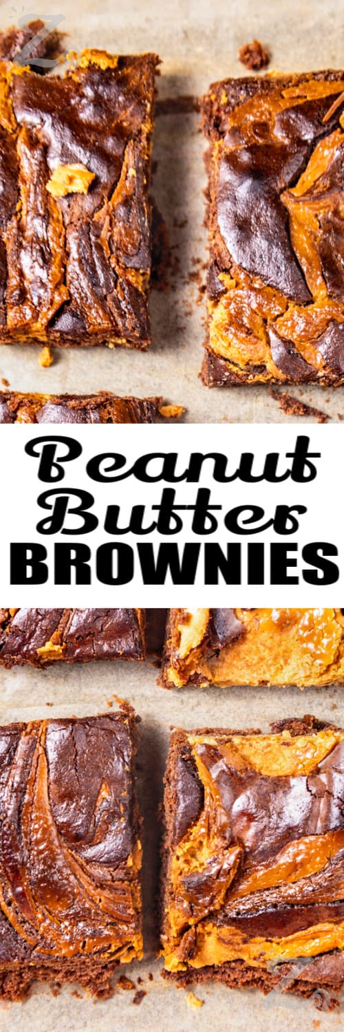 cut up Peanut Butter Brownies on parchment with writing