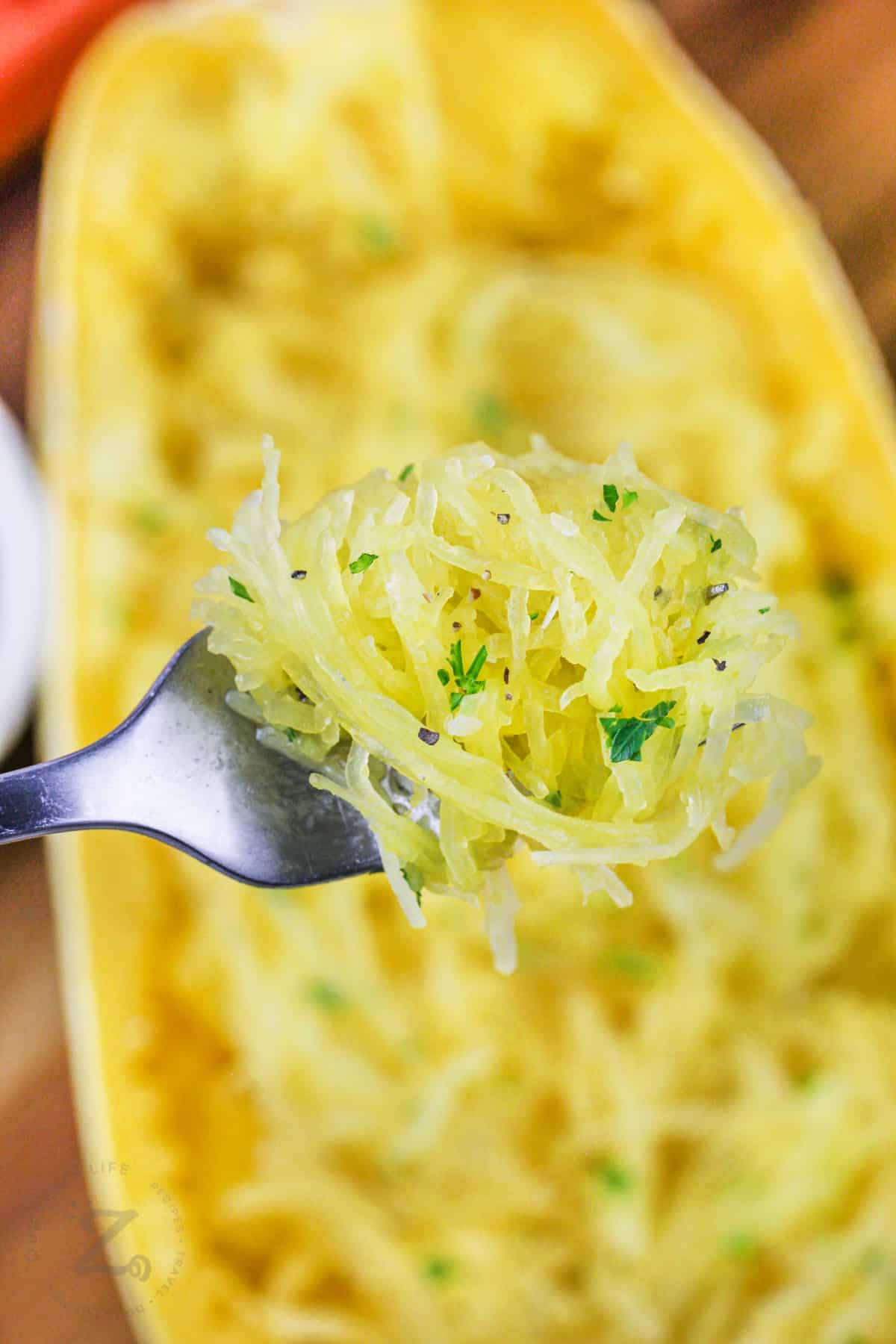 a bite of microwave spaghetti squash on a fork