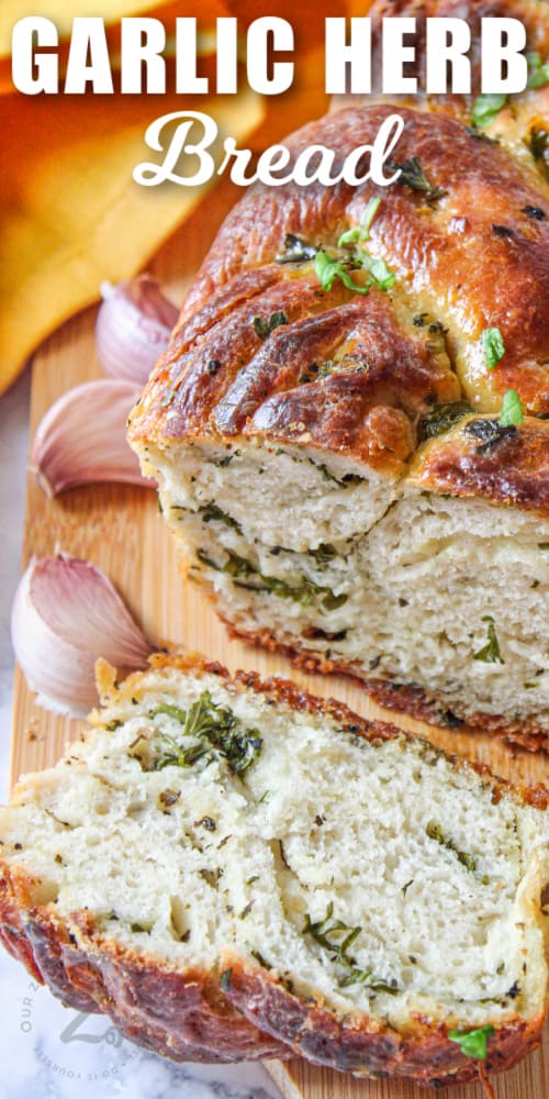 close up of garlic herb bread with writing