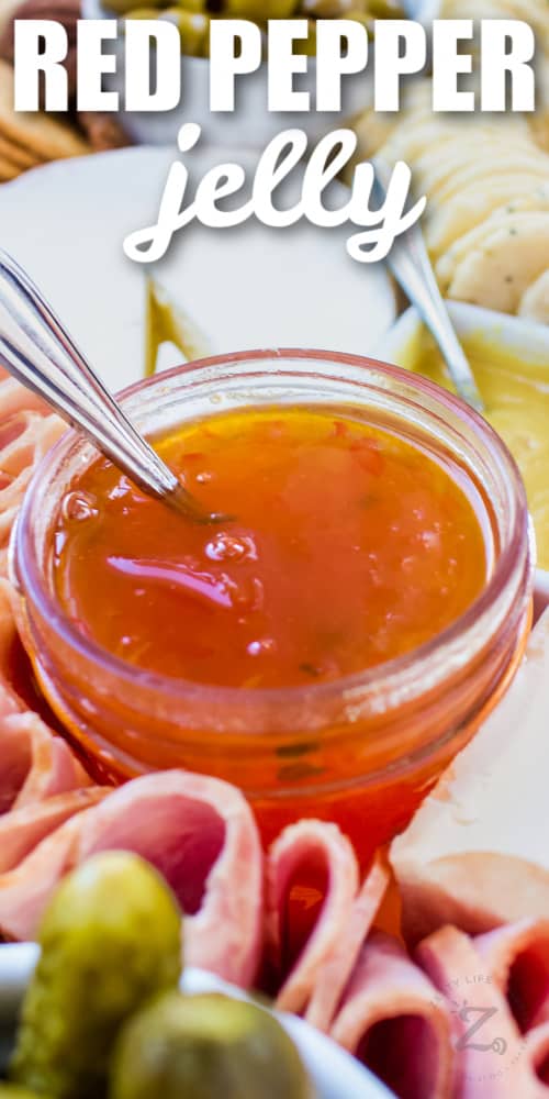 red pepper jelly in a jar with text