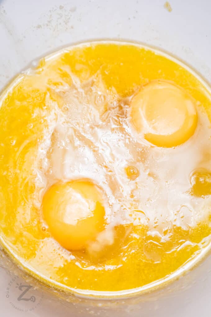 eggs in a bowl for Pumpkin Cinnamon Rolls