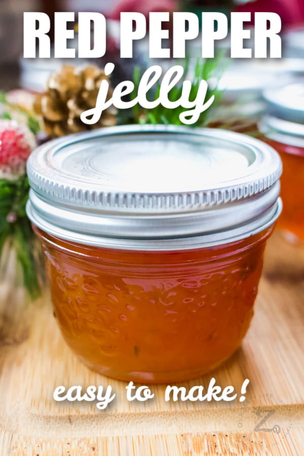red pepper jelly in a small mason jar with writing