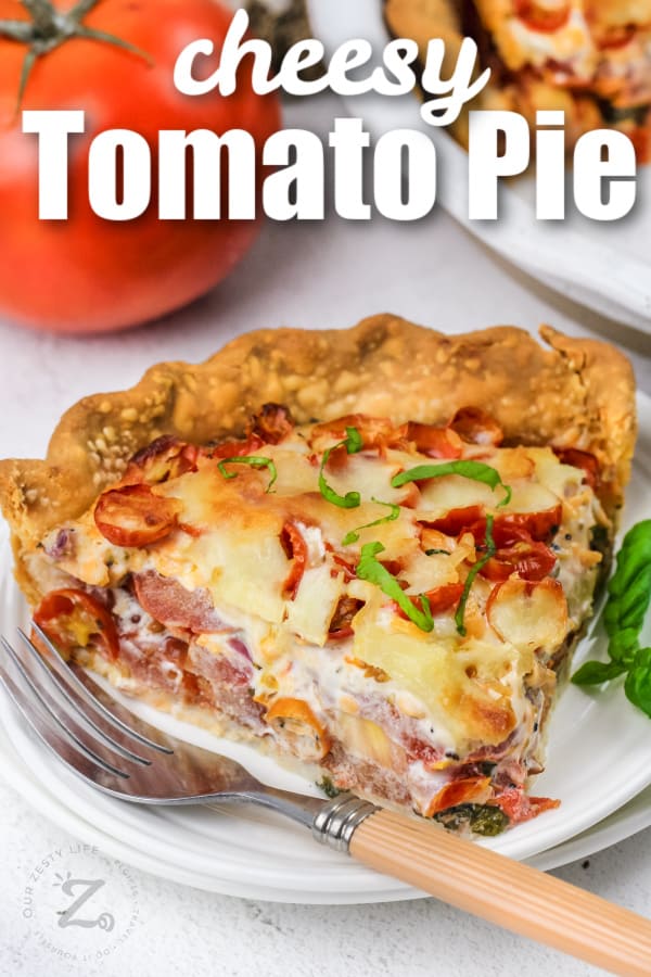 piece of tomato pie with a fork and writing