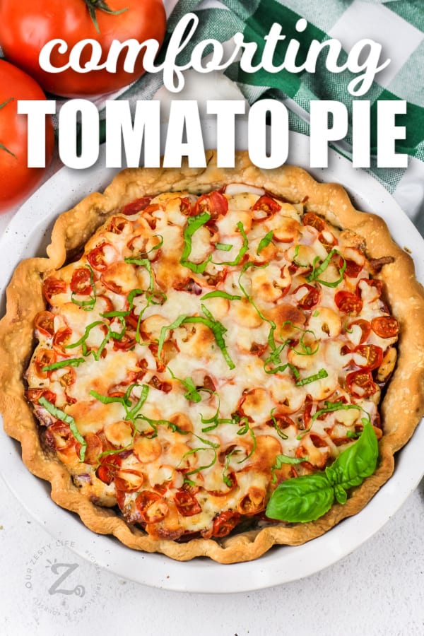 tomato pie in a pie plate with a title