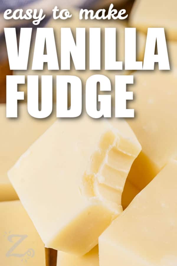 close up of 2 Ingredient Vanilla Fudge with a bite taken out of a piece with a title