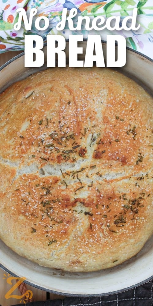 No Knead bread baked in a dutch oven with a title