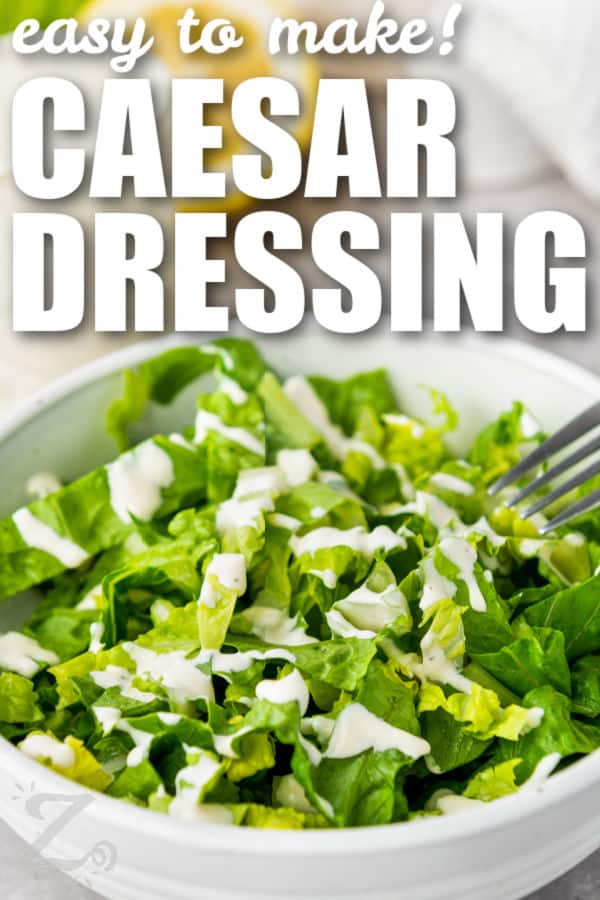Caesar Salad Dressing on a salad with a title