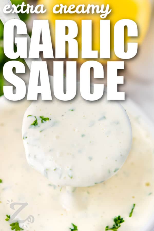 close up of Homemade Garlic Sauce with writing
