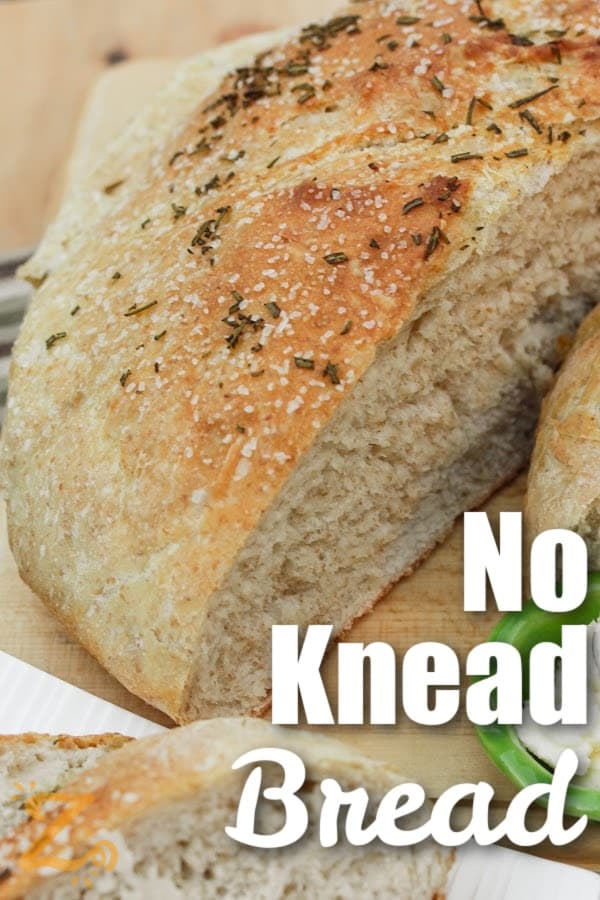 cut loaf of no knead bread with writing