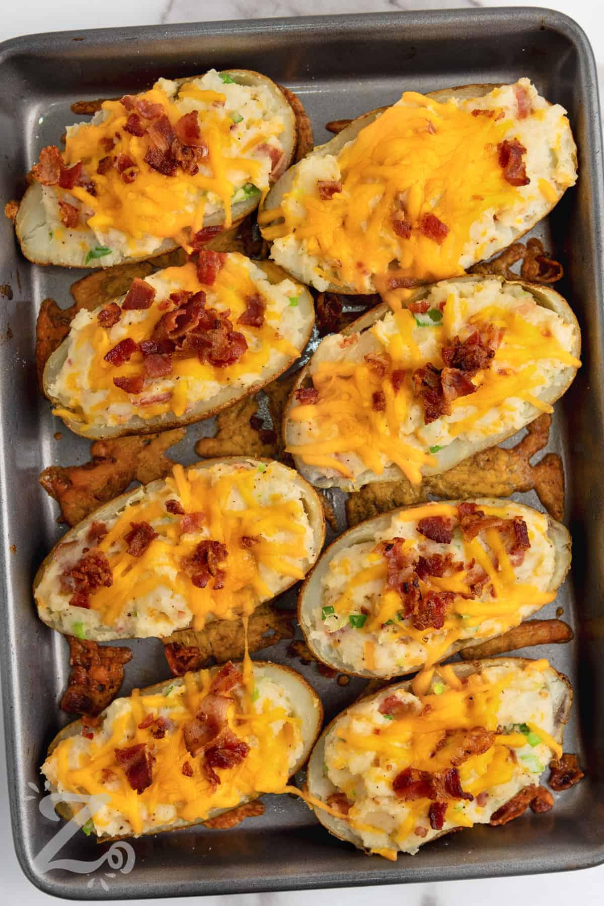 Twice Baked Potatoes cooked on a sheet pan