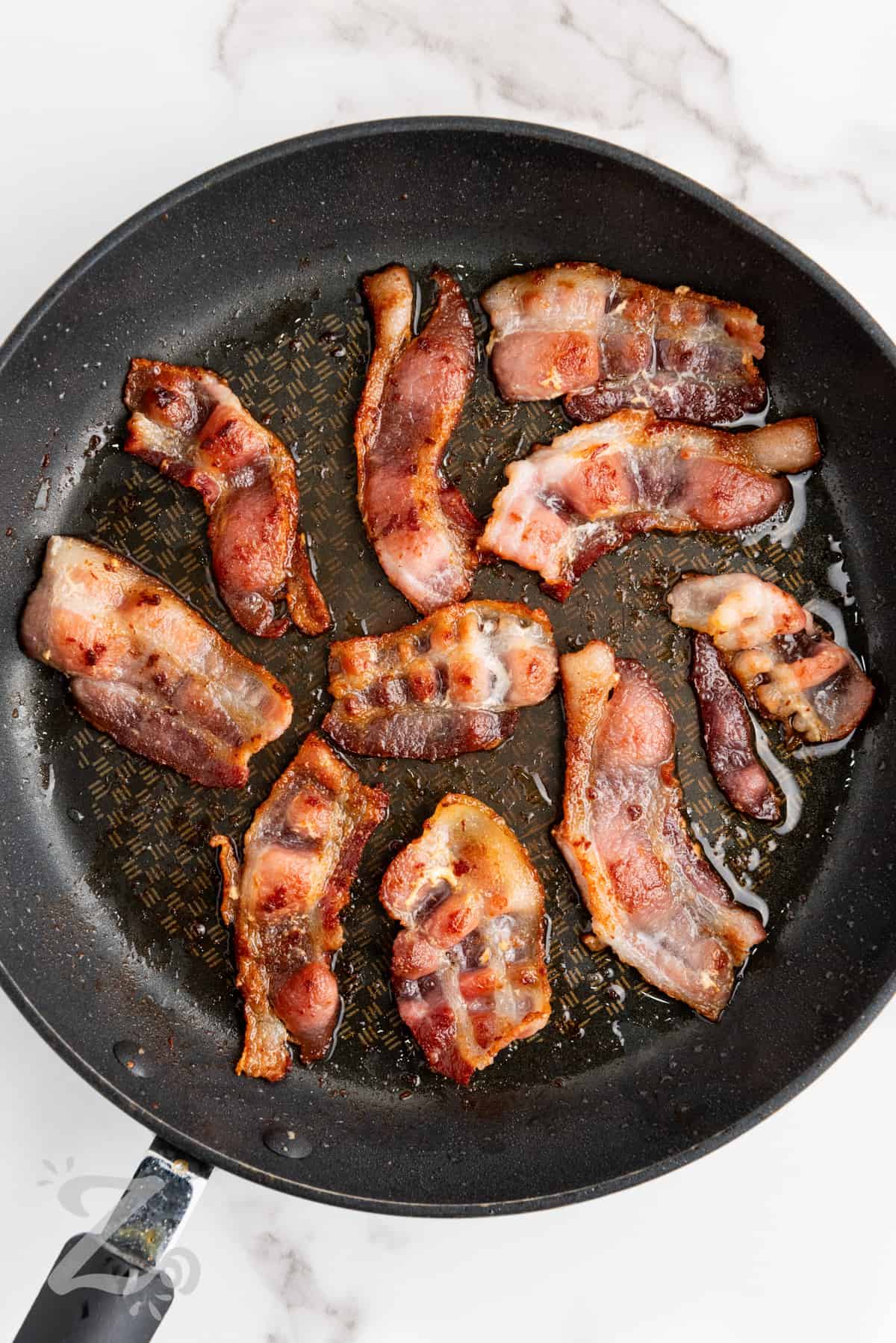 cooking bacon to make Twice Baked Potatoes