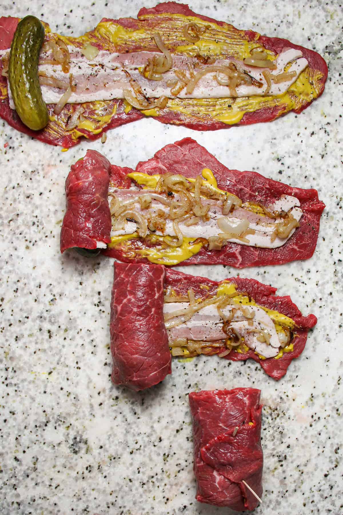 process of rolling up Beef Rouladen