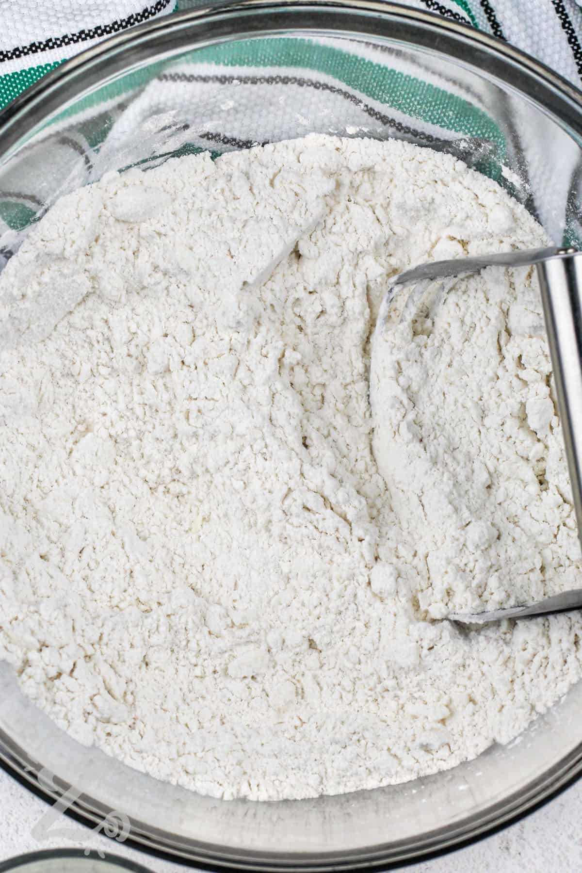 cutting butter in dry ingredients to make Best Irish Soda Bread Recipe