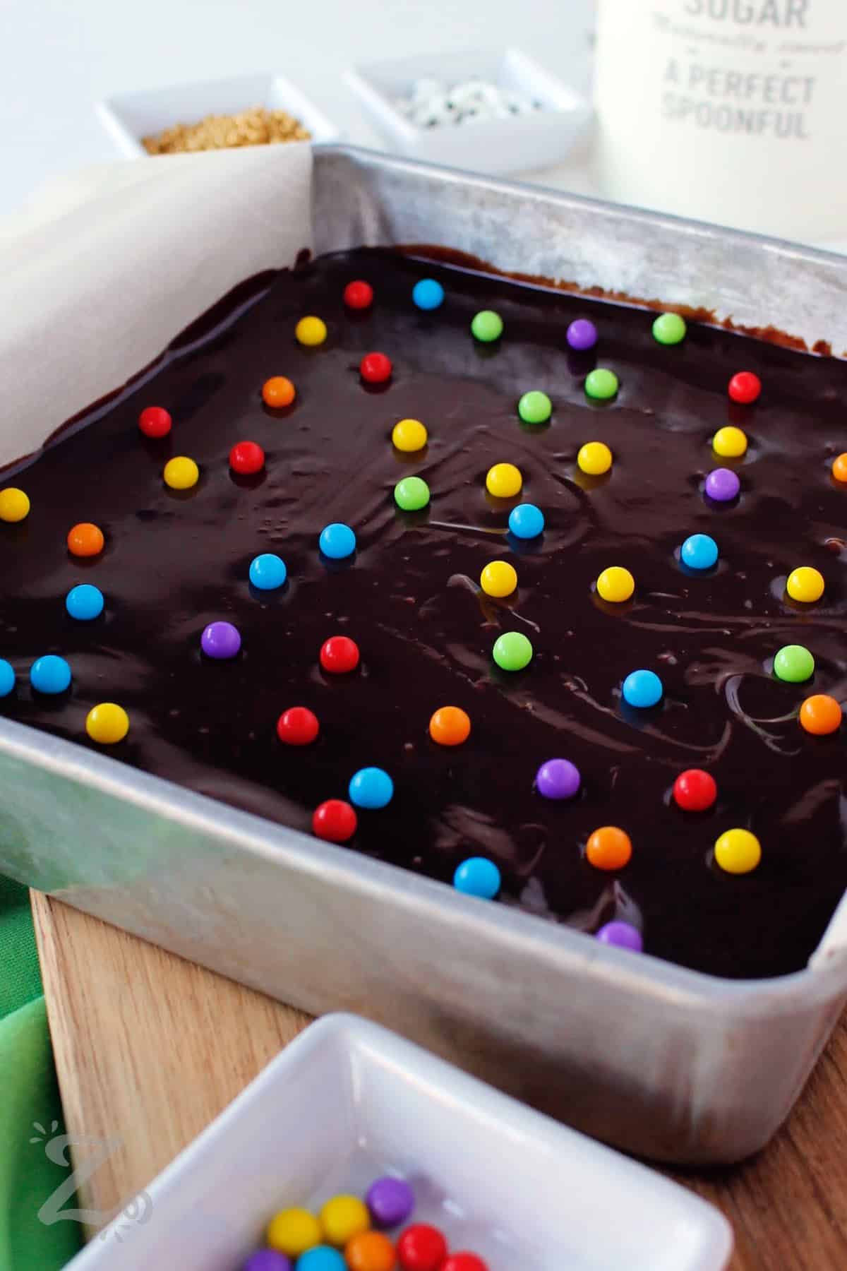 cosmic brownies recipe in a parchment lined pan