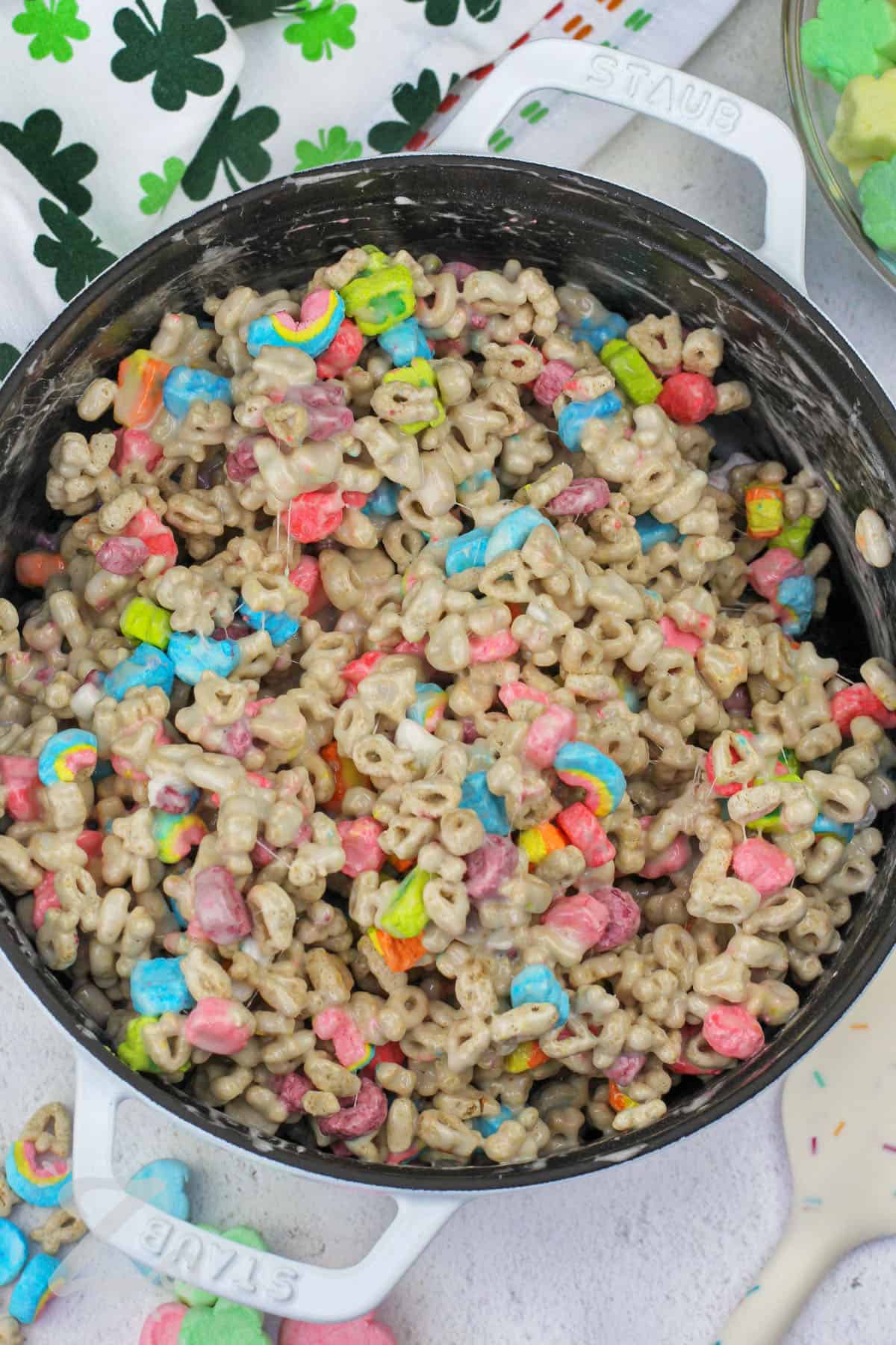 lucky charms with melted marshmallows to make Homemade Lucky Charms Bars