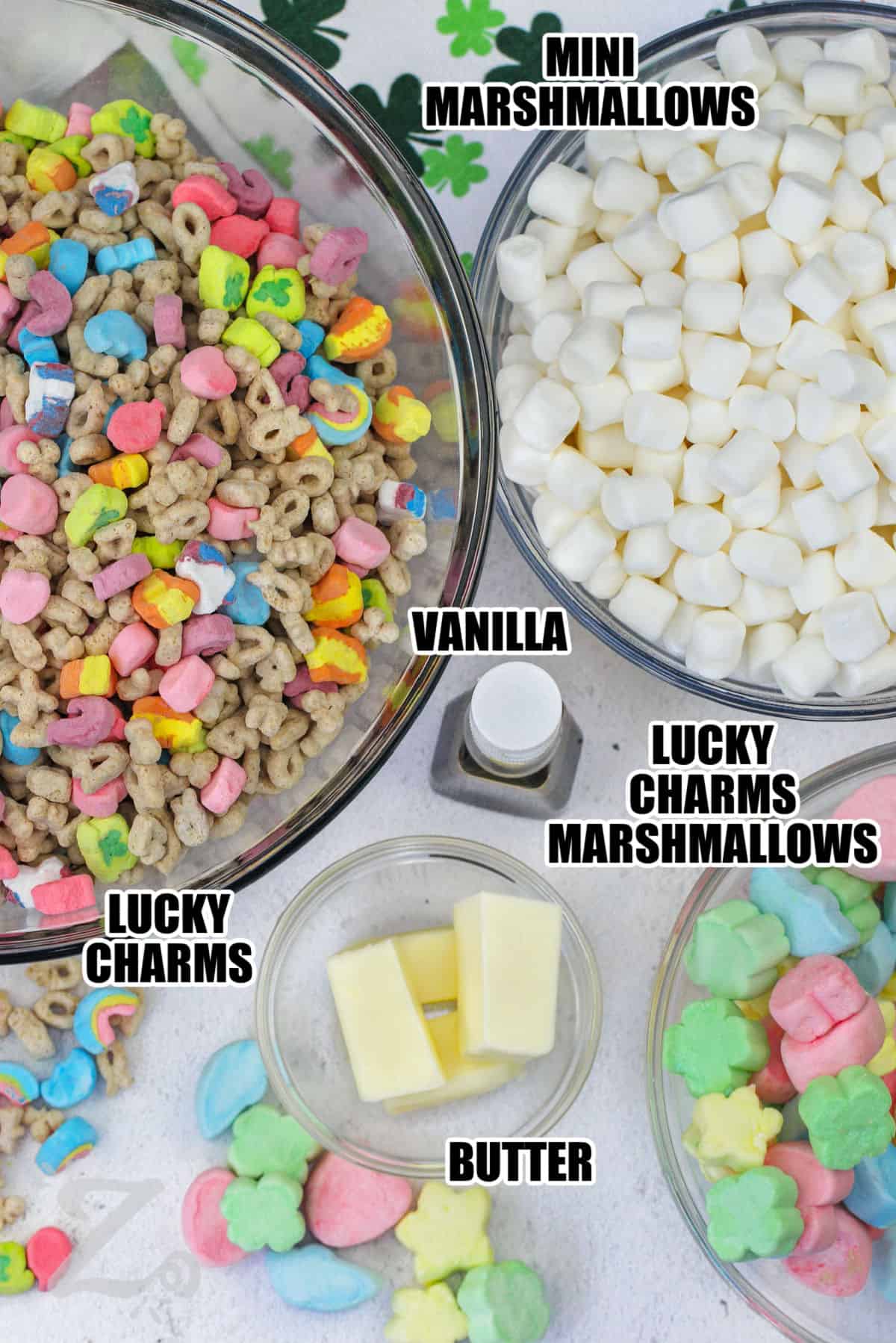 mini marshmallows , vanilla , lucky charms marshmallows , lucky charms and butter with labels to make Homemade Lucky Charms Bars