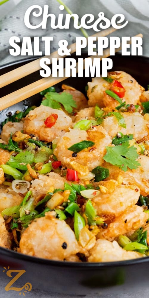 A bowl of Chinese salt and pepper shrimp with text