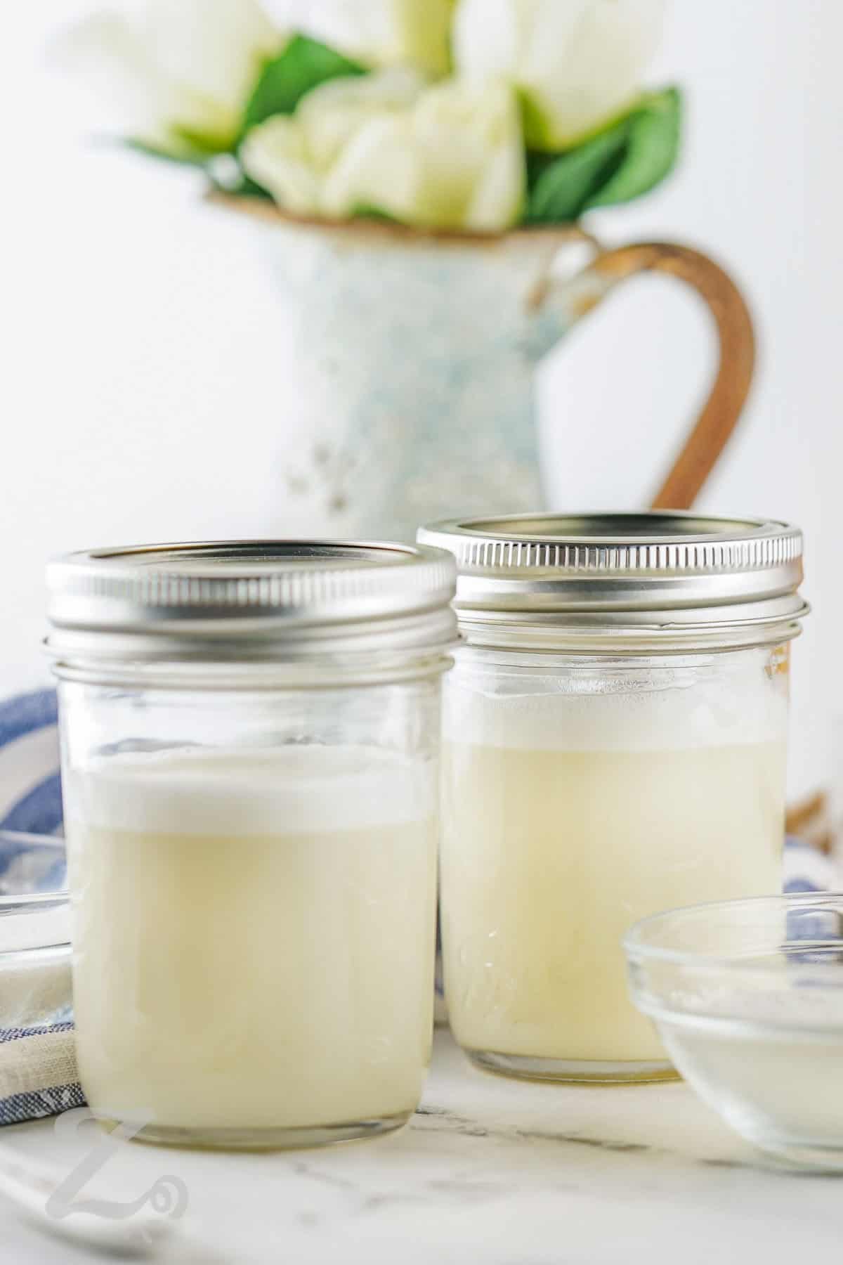two jars of prepared sweetened condensed milk