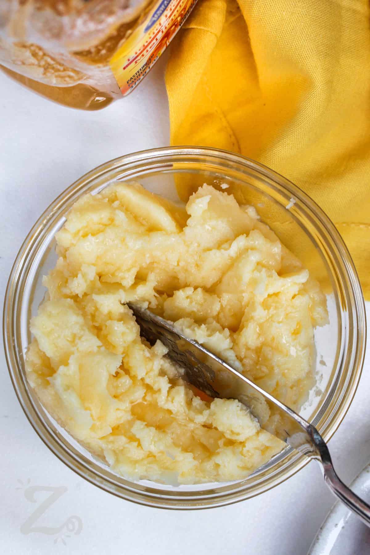 Honey Butter in a bowl with a spreading knife