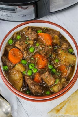 A serving bowl of slow cooker beef stew