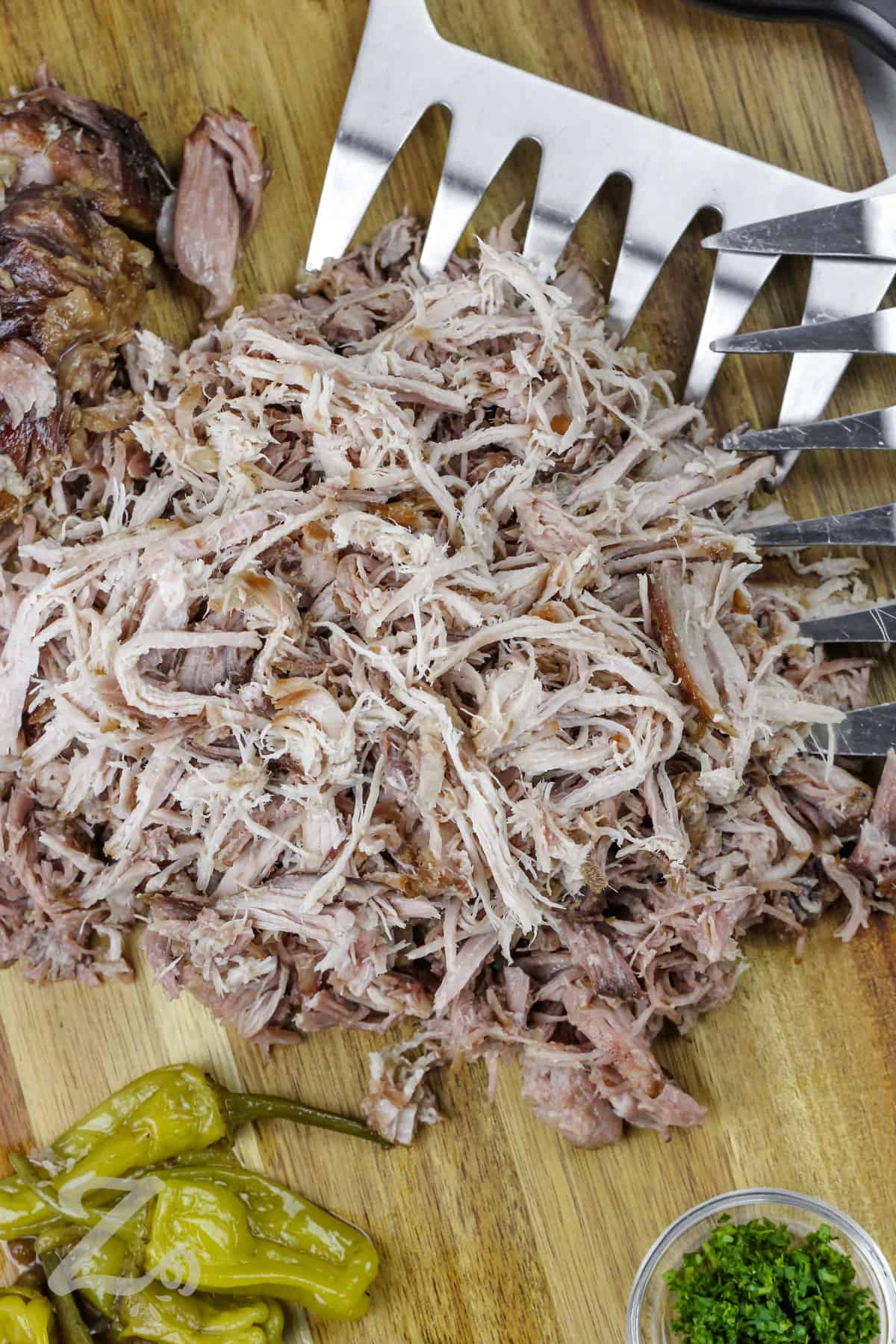 shredded Mississippi pork roast on a cutting board