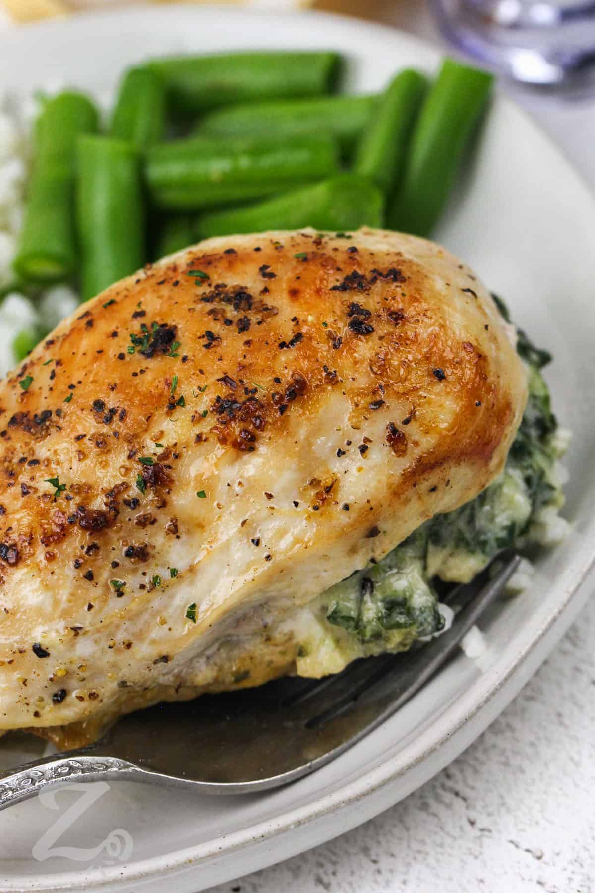 Spinach Stuffed Chicken Breasts on a plate