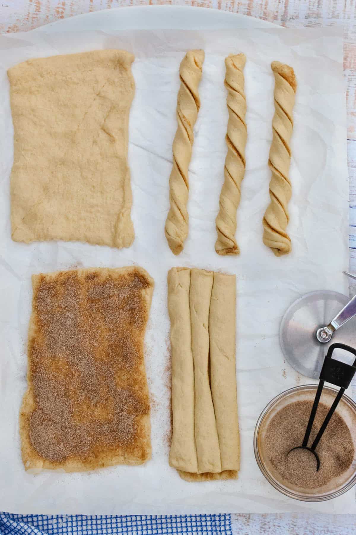 process of filling churros with cinnamon sugar to make Baked Churros