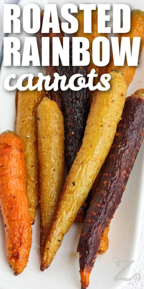 seasoned easy Roasted Rainbow Carrots on a plate with a title