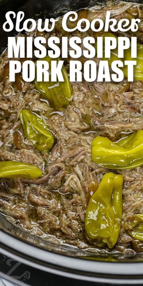Shredded Mississippi Pork Roast in a slow cooker with a title