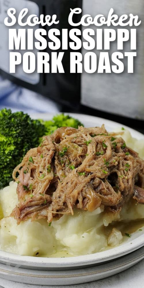 Shredded Mississippi Pork Roast served on top of mashed potatoes with broccoli and a title