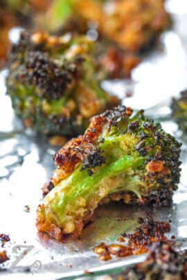 close up of a Parmesan Roasted Broccoli on a sheet pan