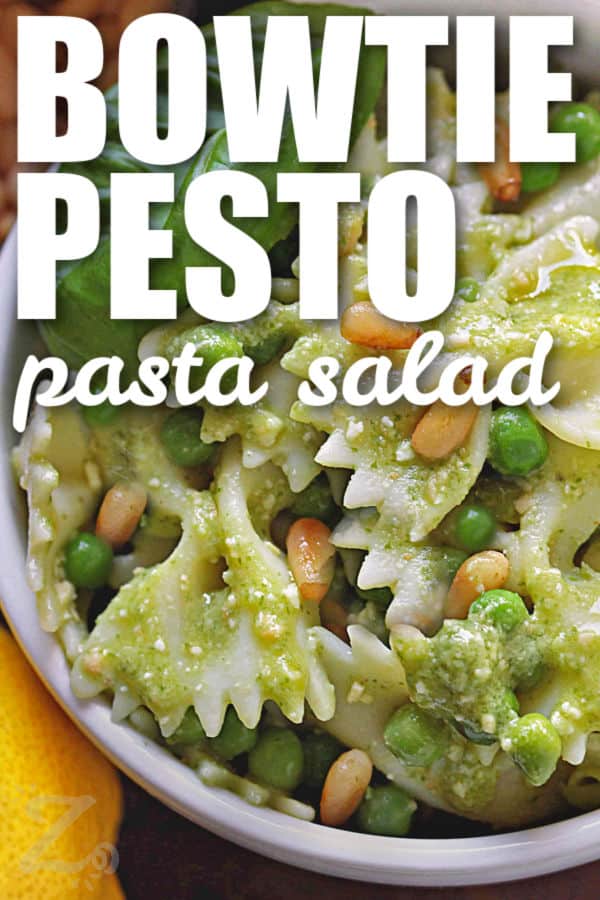 easy Bowtie Pesto Pasta Salad in a bowl with writing