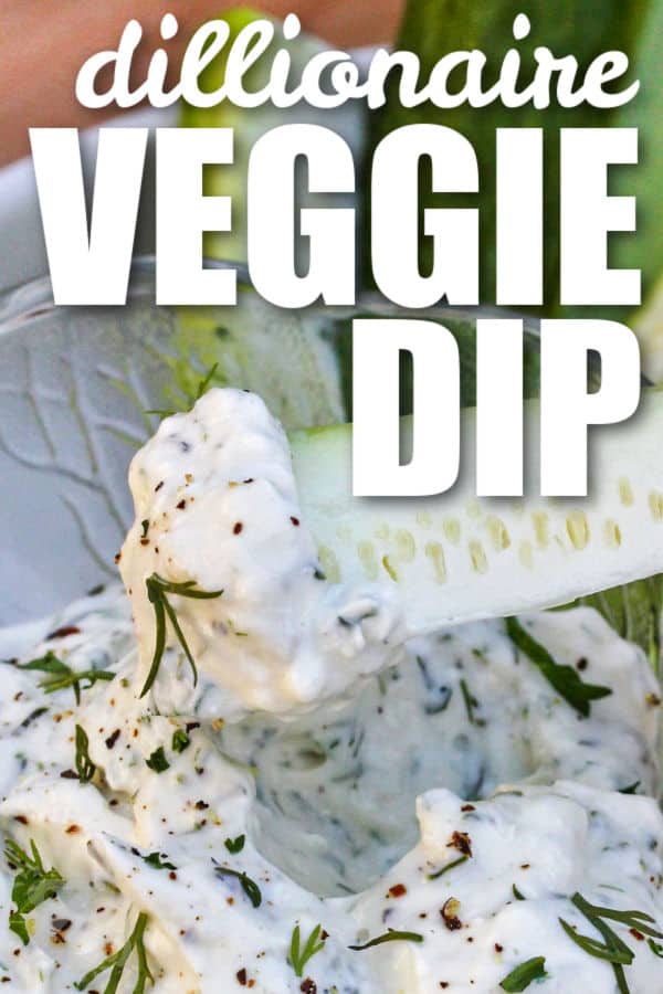 close up of Dillionaire Veggie Dip on a cucumber with writing