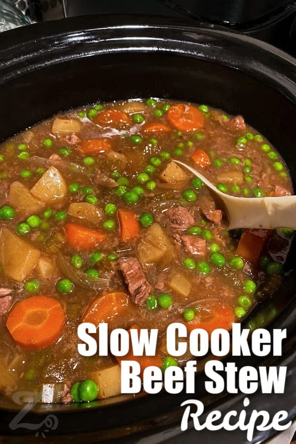 a slow cooker of beef stew with a title