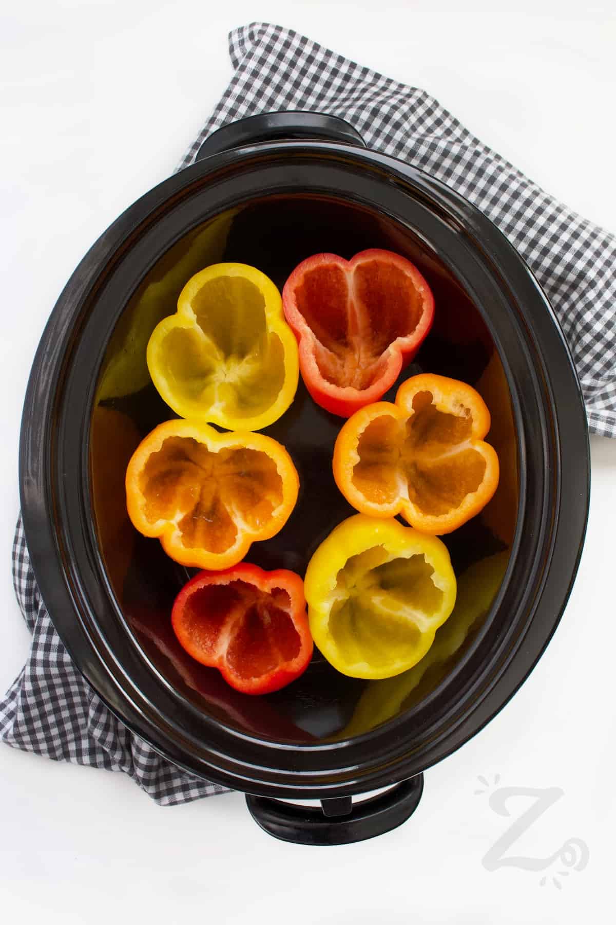 empty bell peppers in a Crock pot to make slow cooker stuffed peppers