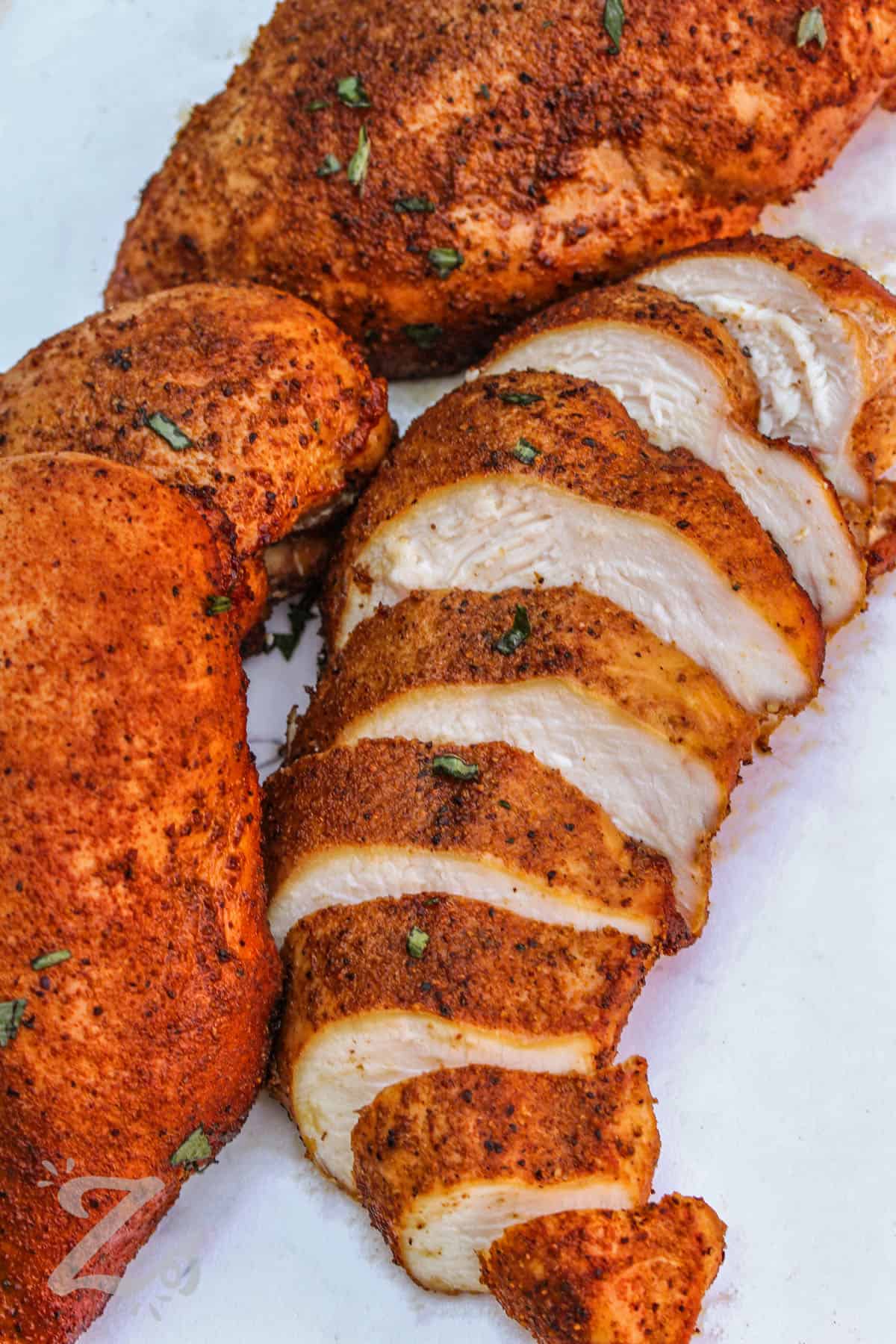 Smoked Chicken Breasts with one cut into slices