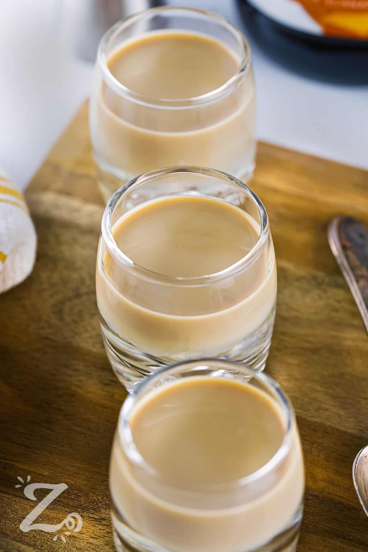 shot glasses filled with Buttery Nipple Shot