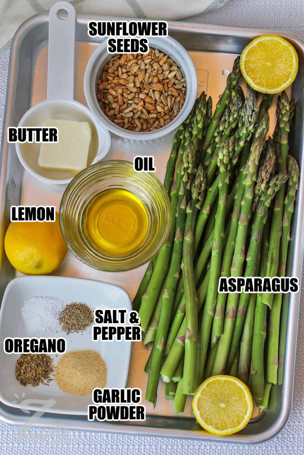 asparagus , oil , garlic powder , oregano, salt and pepper , lemon , butter and sunflower seeds with labels to make Sauteed Asparagus