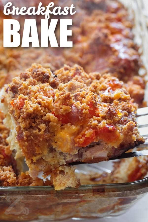 A slice of breakfast bake being served from a casserole dish with text