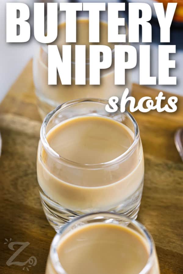 easy Buttery Nipple Shot in shot glasses with a title