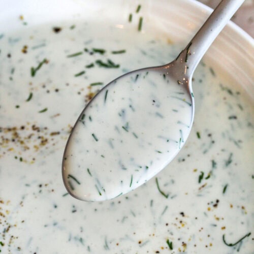 Dill Dressing in a bowl and on a spoon