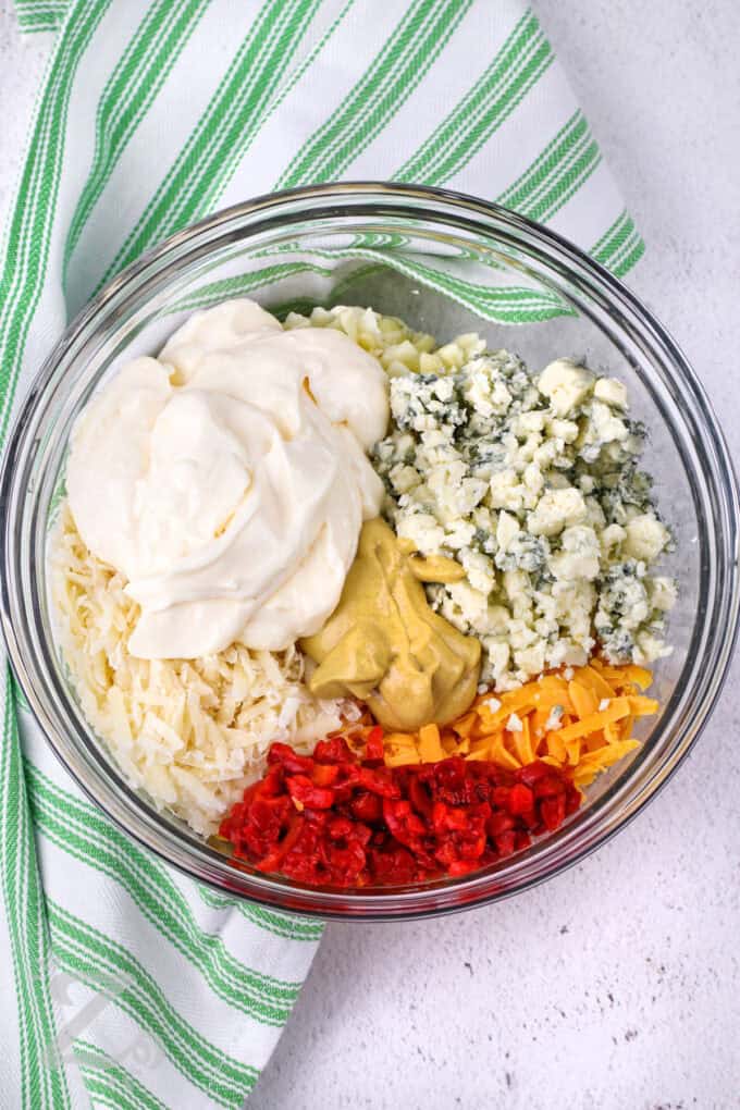 ingredients to make pimento cheese sandwich combined in a bowl