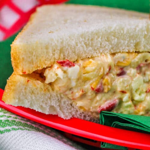 A pimento cheese sandwich half in a serving basket