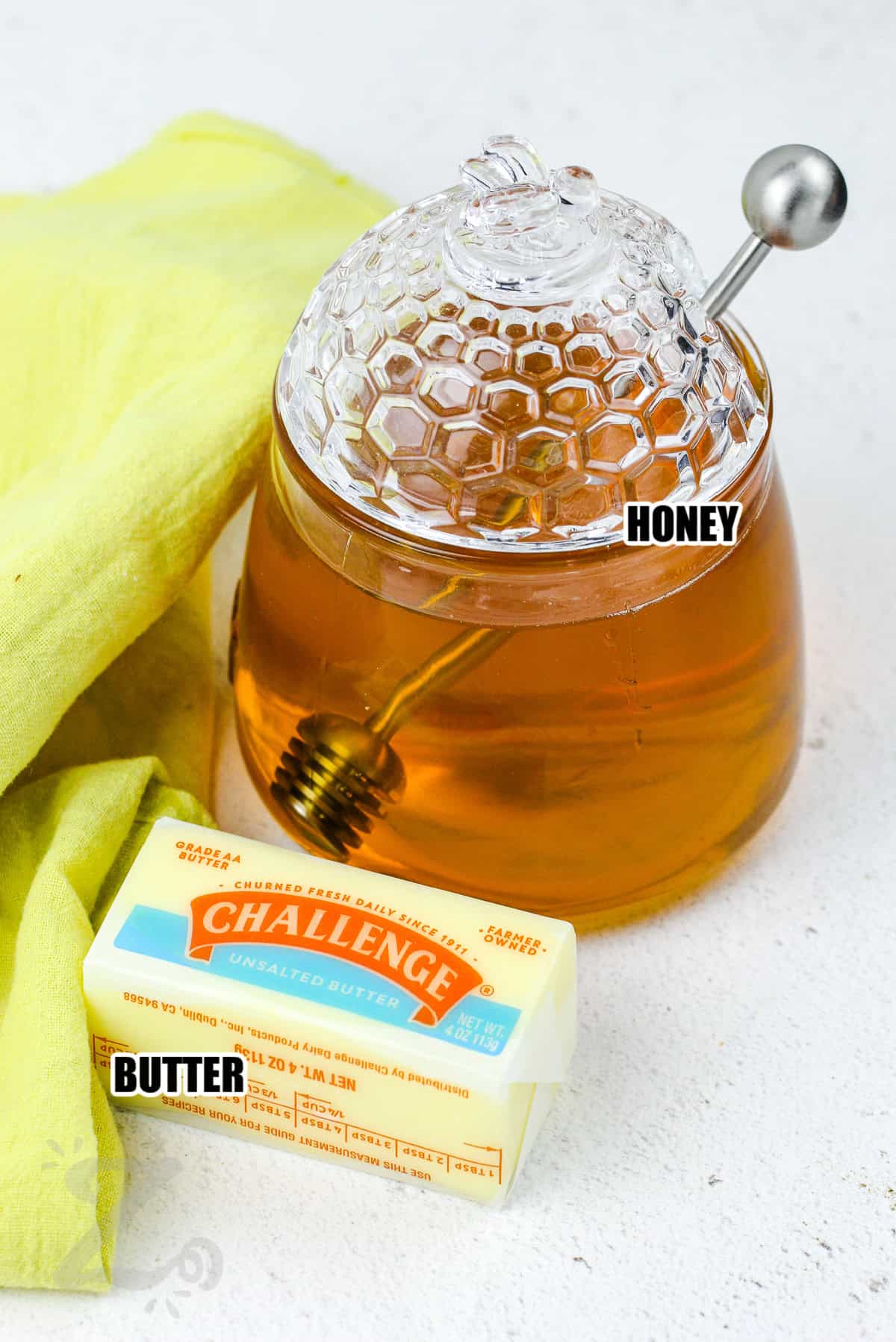 ingredients to make honey butter labeled: honey and butter